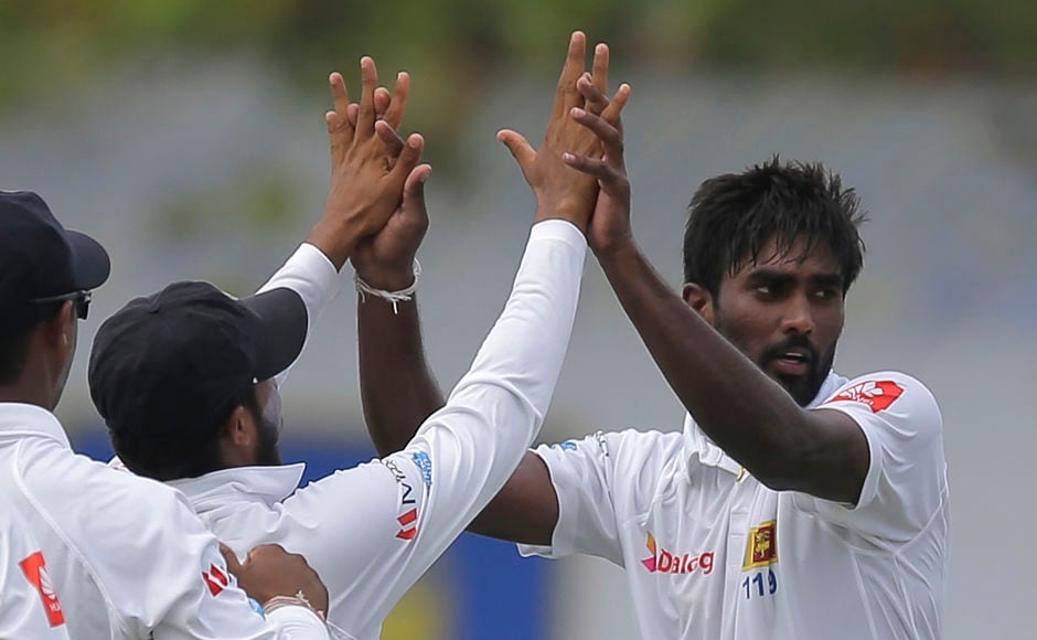 Sri Lanka's Nuwan Pradeep got rid of Shikhar Dhawan for 190. AP