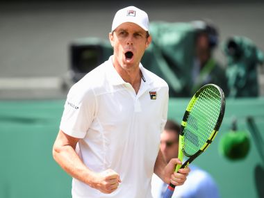 Tennis - Wimbledon - London, Britain - July 14, 2017 Sam Querrey of the U.S. celebrates winning the first set during the semi final match against Croatias Marin Cilic REUTERS/Toby Melville - RTX3BGH5