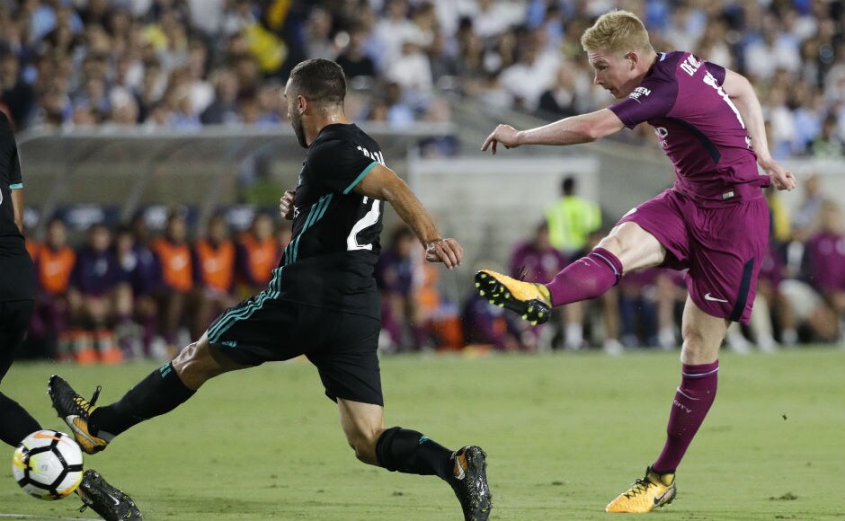 Manchester City's Kevin De Bruyne, right, shoots under pressure from Real Madrid's Daniel Carvajal during the first half. AP Manchester City's Kevin De Bruyne, right, shoots under pressure from Real Madrid's Daniel Carvajal during the first half. AP