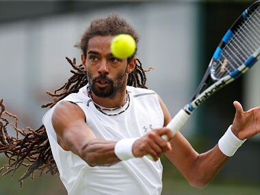 Germany's Dustin Brown in action during his first round match against Portugal's Joao Sousa. Reuters