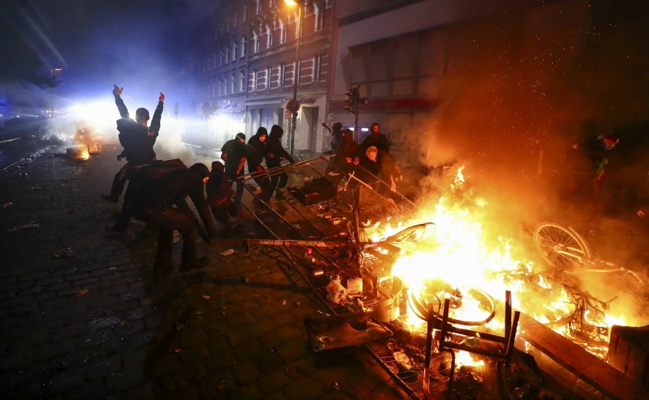 As world leaders started to arrive in Hamburg, protesters set dozens of cars and barricades on fire blocking the way of delegations . Reuters As world leaders started to arrive in Hamburg, protesters set dozens of cars and barricades on fire blocking the way of delegations . Reuters