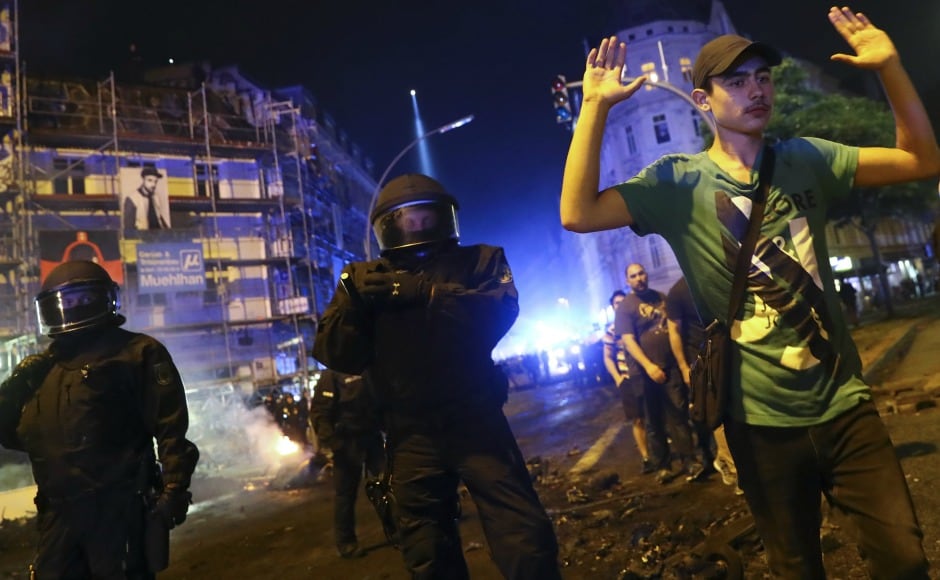 As clashes between protects and authorities escalated, German police arrested hundreds of protesters . Reuters As clashes between protects and authorities escalated, German police arrested hundreds of protesters . Reuters