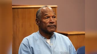 OJ Simpson granted parole in armed robbery case, to be freed as early as October