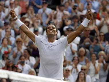 Spain's Rafael Nadal celebrates after winning against Russia's Karen Khachanov in their Men's Singles Match on day five at the Wimbledon Tennis Championships in London Friday, July 7, 2017. (AP Photo/Alastair Grant)