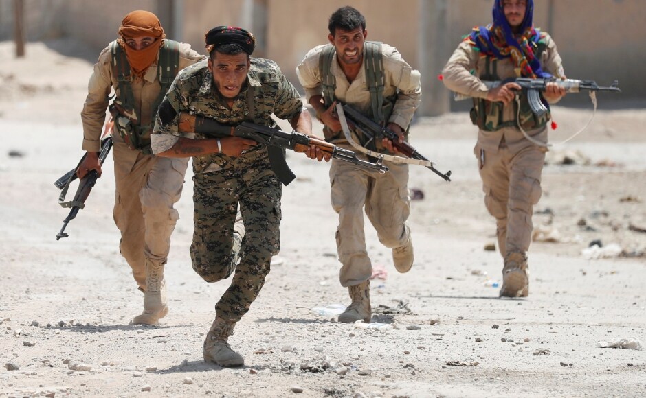 US-backed Syrian forces attack Raqqa, breach Old Wall in efforts to retake Islamic States de-facto capital