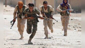 US-backed Syrian forces attack Raqqa, breach Old Wall in efforts to retake Islamic State's de-facto capital