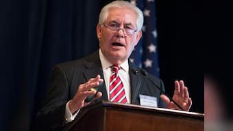 Rex Tillerson says US sanctions will remain until Russia takes the 'first step' to end Ukraine conflict