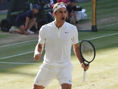 Roger Federer celebrates winning the quarter-final match against Milos Raonic. Reuters