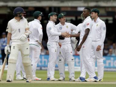 South African players gather after Liam Dawson makes his way back to the pavilion. AP