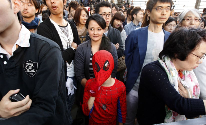 A child in Tokyo wearing a Spider-Man costume. Reuters