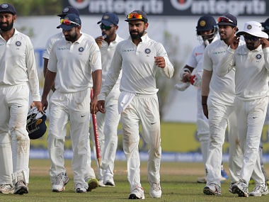 India's captain Virat Kohli leaves the ground with his teammates after their win in the first Test match against Sri Lanka. AP