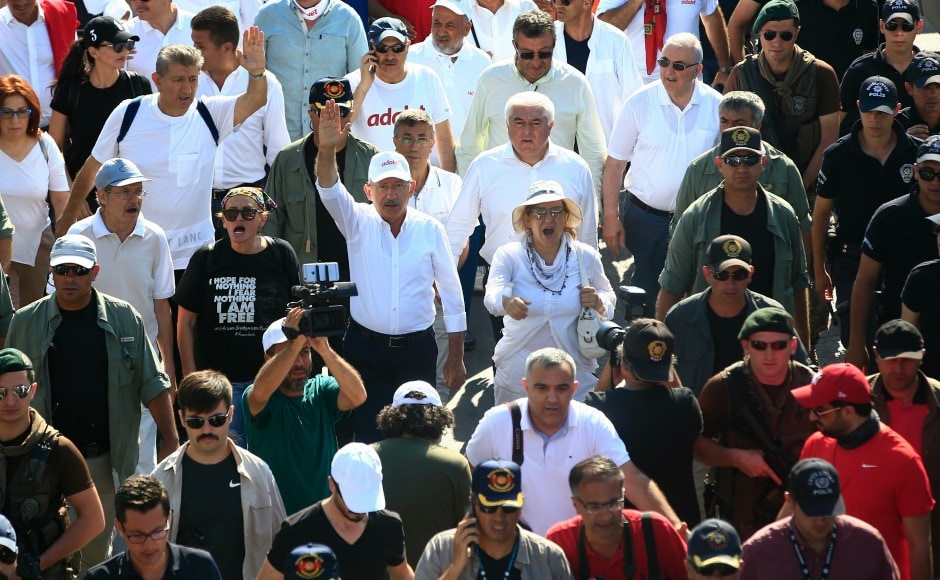 Kemal Kilicdaroglu led the protest and as thousands of his supporters shouted anti-government slogans demanding rights, law and justice.AP Kemal Kilicdaroglu led the protest and as thousands of his supporters shouted anti-government slogans demanding rights, law and justice.AP