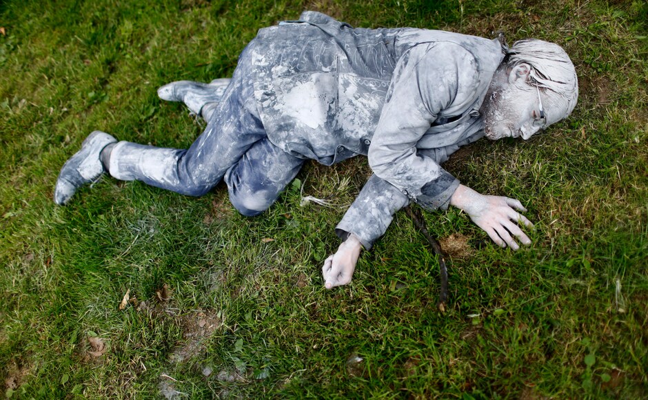 One of the demonstrators lies on the ground in Hamburg on Wednesday. Reuters One of the demonstrators lies on the ground in Hamburg on Wednesday. Reuters