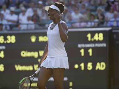 Venus Williams of the United States celebrates after winning the Women's Singles Match against China's Qiang Wang on day three at the Wimbledon Tennis Championships in London Wednesday, July 5, 2017. (AP Photo/Alastair Grant)
