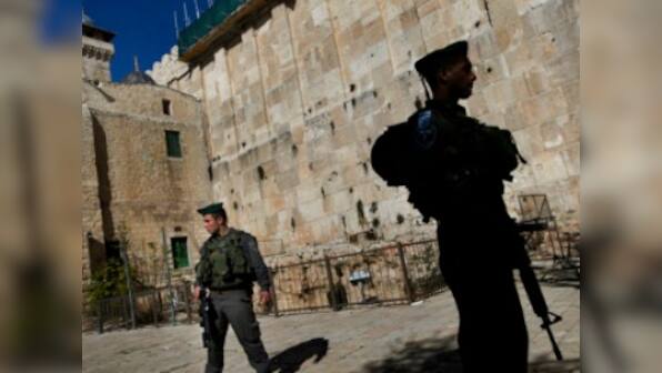 Jerusalem shooting: Israel to reopen holy site amid concerns of violence after attack