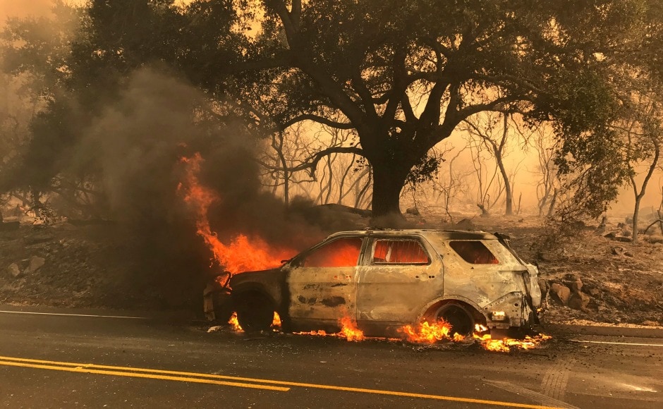 Some 59,305 acres of land were ravaged by wildfires as of Sunday afternoon. AP Some 59,305 acres of land were ravaged by wildfires as of Sunday afternoon. AP