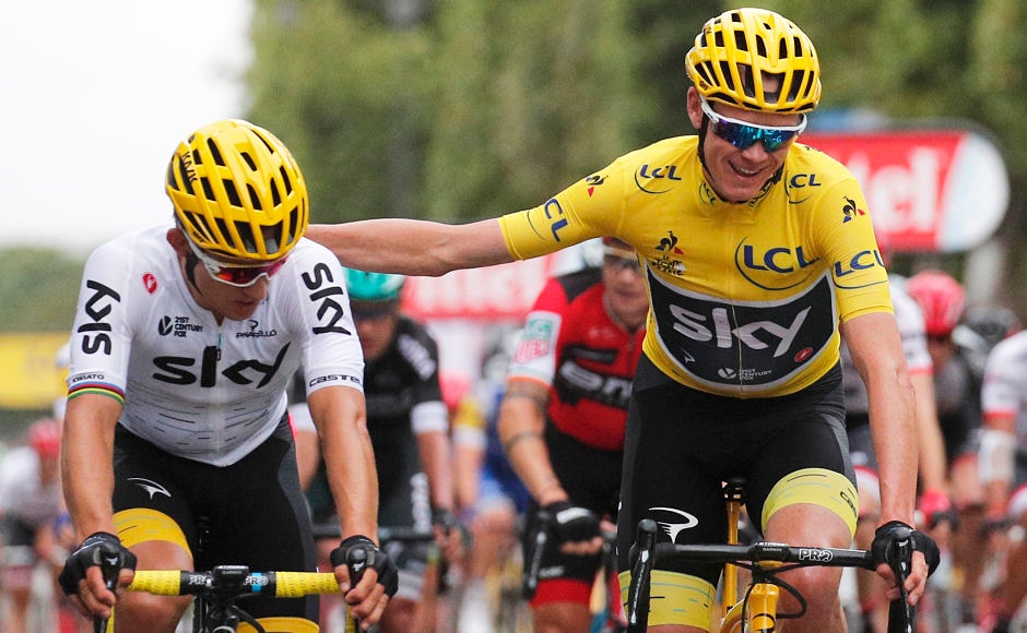Tour de France winner Chris Froome(yellow jersey) and Poland's Michal Kwiatkowski cross the finish line of Stage 21 that marked the end of a three-week long gruelling race. AP Tour de France winner Chris Froome(yellow jersey) and Poland's Michal Kwiatkowski cross the finish line of Stage 21 that marked the end of a three-week long gruelling race. AP