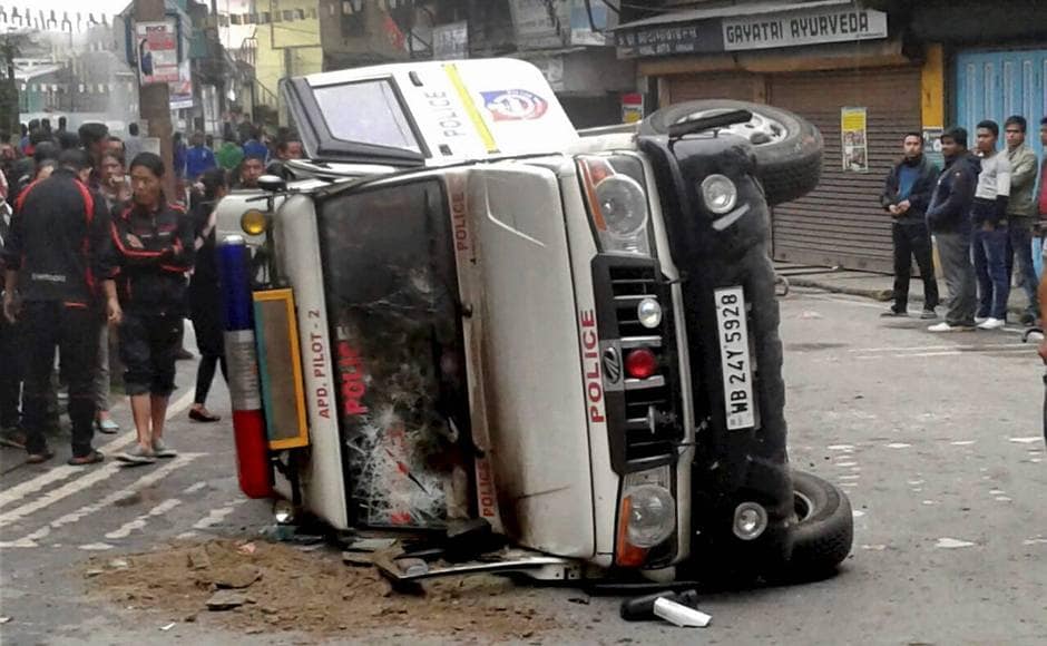 In Sunday's violence, a police vehicle was damaged during violence following the death a youth allegedly in police firing in Darjeeling. PTI In Sunday's violence, a police vehicle was damaged during violence following the death a youth allegedly in police firing in Darjeeling. PTI