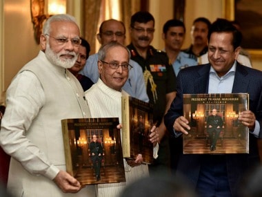 Narendra Modi and Pranab Mukherjee at the book launch event at Rashtrapati Bhavan on Sunday. PTI