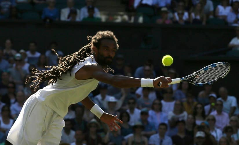 Germany&rsquo;s Dustin Brown returns to Britain&rsquo;s Andy Murray during their Men&rsquo;s Singles Match on day three at Wimbledon. AP