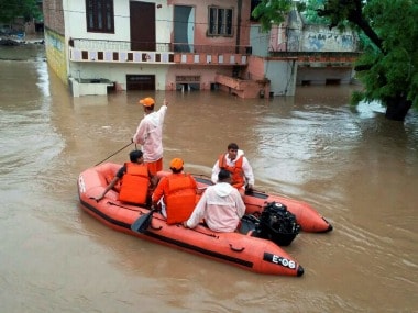 Rescue team at work in a flood-affected locality in Pali district of Rajasthan on Tuesday. PTI