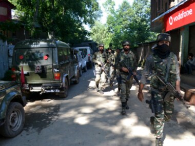 Soldiers near an encounter site in Dialgam village were two militants and two civilians were killed on Saturday. Firstpost/Sameer Yasir