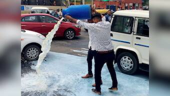 Farmers' unrest: Gujarat agitators empty milk cans demanding farm loan waiver