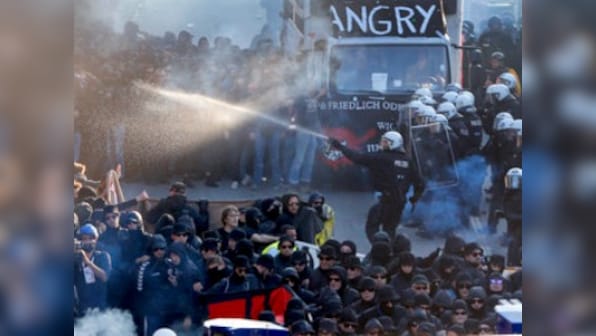 Police clash with protesters in Hamburg as world leaders arrive for G20 summit
