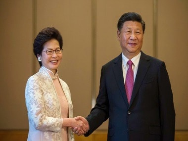 Xi Jinping with Carrie Lam. AP