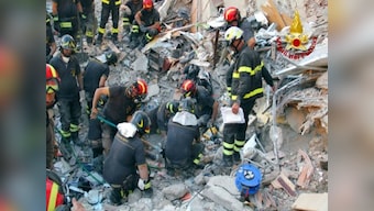 Italy building collapse: Firefighters pull out eighth body from rubble; cause of incident under investigation