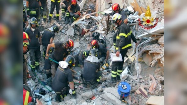 Italy building collapse: Firefighters pull out eighth body from rubble; cause of incident under investigation