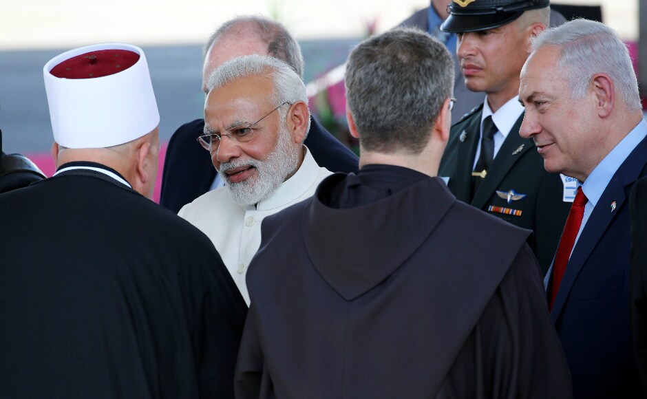 Prime Minister Narendra Modi and Israeli prime minister Benjamin Netanyahu greet others during the welcoming ceremony. Reuters Prime Minister Narendra Modi and Israeli prime minister Benjamin Netanyahu greet others during the welcoming ceremony. Reuters