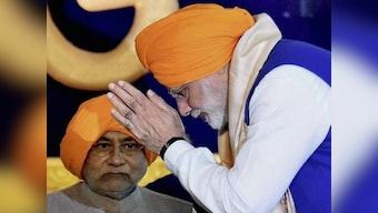 Nitish and Modi join hands, ditch Grand Alliance: After 20 years, Centre-state unity may help Bihar get special status