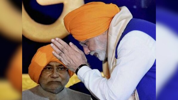 Nitish and Modi join hands, ditch Grand Alliance: After 20 years, Centre-state unity may help Bihar get special status