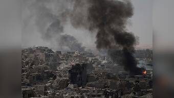 Sporadic clashes continue in Mosul after Haider al-Abadi declares victory over Islamic State