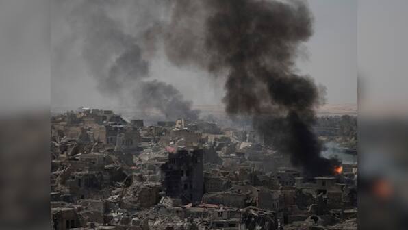 Sporadic clashes continue in Mosul after Haider al-Abadi declares victory over Islamic State
