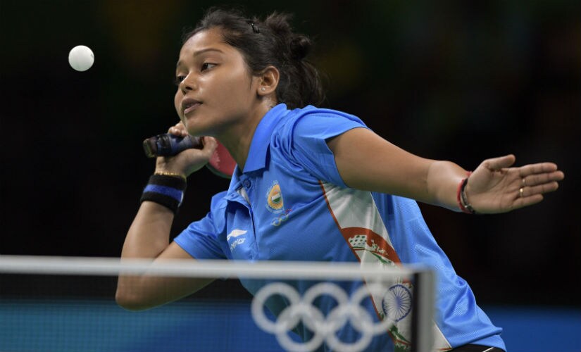 Mouma Das hits a shot in her women's singles qualification round table tennis match at the Riocentro venue during the Rio 2016 Olympics. AFP