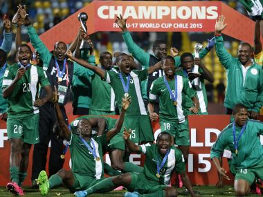 Nigeria's players celebrate with the FIFA U-17 World Cup in 2015. AFP