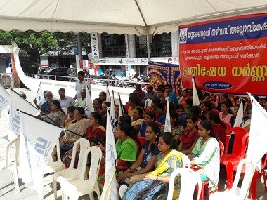 Nurses sitting on a protest. Twitter/ @shakeerali231