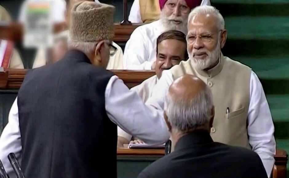 Prime Minister Narendra Modi greets JKNC President Farooq Abdullah after he was sworn-in as a member of the Lok Sabha in New Delhi on Monday. PTI Prime Minister Narendra Modi greets JKNC President Farooq Abdullah after he was sworn-in as a member of the Lok Sabha in New Delhi on Monday. PTI