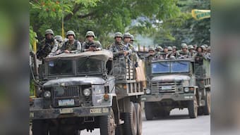Philippino armed forces use air strikes to target Islamic State snipers in high-rise buildings