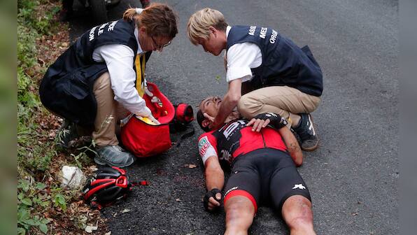 Tour de France 2017: Chris Froome holds on to yellow jersey in a stage marred by crashes and heartbreaks