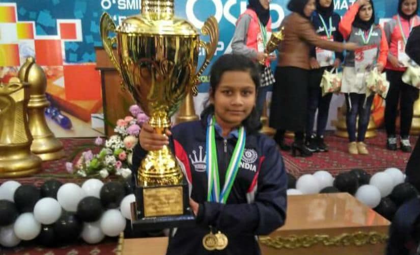 Sahithi with two gold medals (classical and blitz) and the trophy in the Asian Youth Chess Championship.