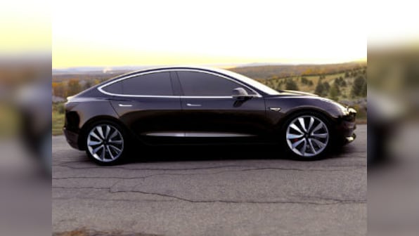 Tesla reports $619 million loss in Q3 to clear up bottlenecks in Model 3 production