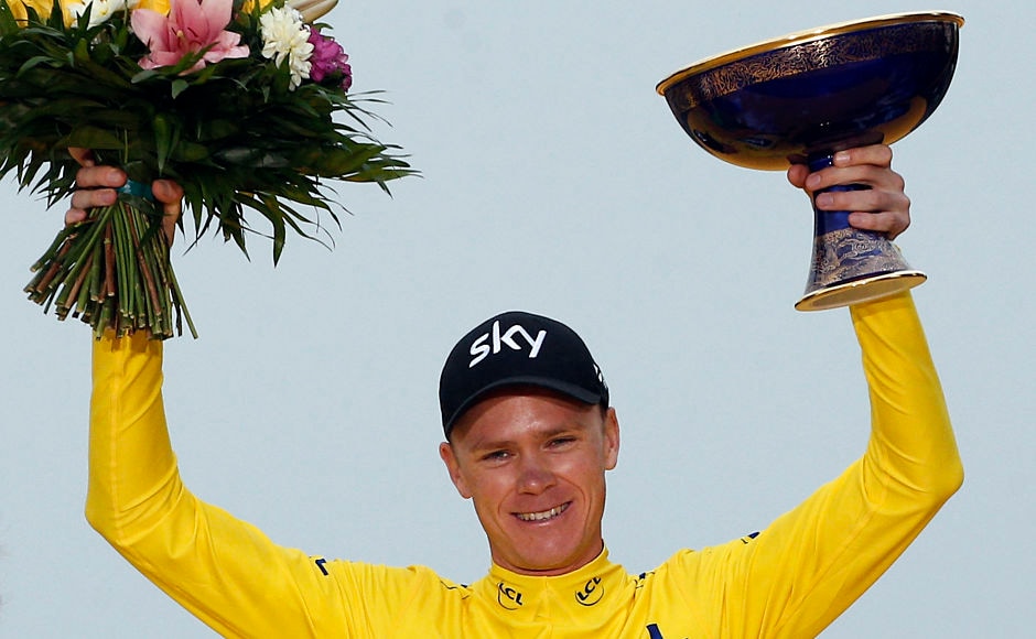 Britain's Chris Froome, wearing the overall leader's yellow jersey, celebrates on the podium after Stage 21 of the Tour de France. Froome won his fourth and most challenging Tour de France title on Sunday. AP Britain's Chris Froome, wearing the overall leader's yellow jersey, celebrates on the podium after Stage 21 of the Tour de France. Froome won his fourth and most challenging Tour de France title on Sunday. AP