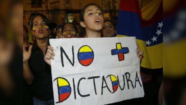 Venezuelan president Nicolas Maduro urges citizens to vote peacefully as political violence worsens