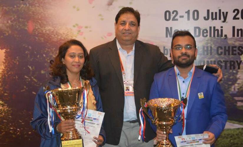 Commonwealth champions WGM Swati Ghate and GM Abhijeet Gupta with AICF secretary, Bharat Singh Chauhan.