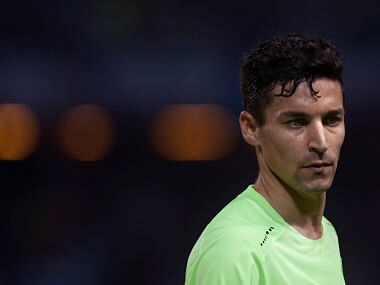 (FILES) This file photo taken on November 03, 2015 shows Manchester City's midfielder Jesus Navas looks on during the UEFA Champions League football match Sevilla FC vs Manchester City at the Ramon Sanchez Pizjuan stadium in Sevilla on November 3, 2015. Spanish international winger Jesus Navas returned to Sevilla on August 1, 2017, the La Liga club announced on their website. / AFP PHOTO / Jorge Guerrero