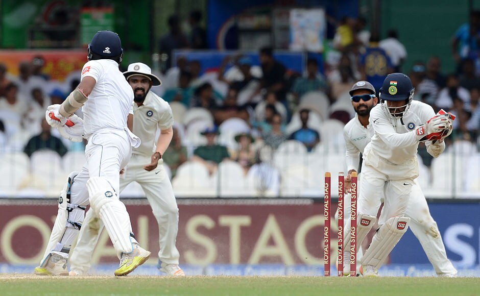 Wriddhiman Saha continued his splendid time behind the stumps with a relatively easy stumping of Dilruwan Perera. AFP Wriddhiman Saha continued his splendid time behind the stumps with a relatively easy stumping of Dilruwan Perera. AFP