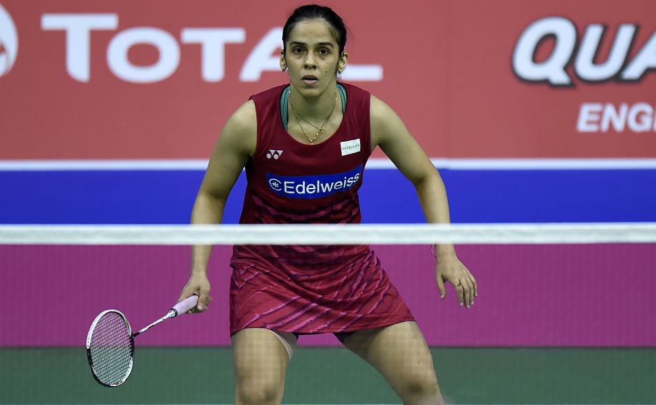 India's Saina Nehwal waits to receive against South Korea's Sung Ji Hyun during their round three women's singles match during the 2017 BWF World Championships of badminton at Emirates Arena in Glasgow on August 24, 2017. / AFP PHOTO / ANDY BUCHANAN